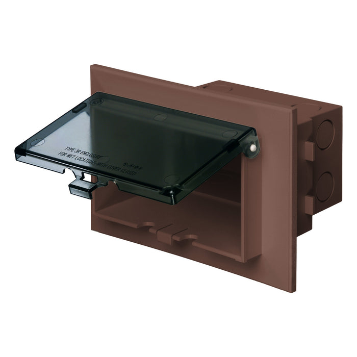 Arlington DBHB1BRC low-profile recessed electrical box with brown base and clear weatherproof in-use cover, open view.