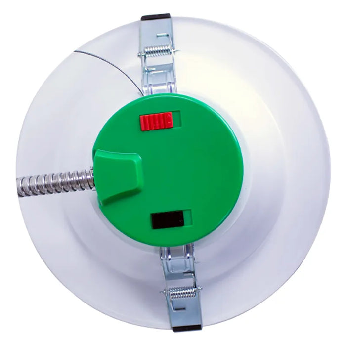 Westgate CRLE4 LED downlight rear view showing green housing, mounting clips, and electrical connection components.